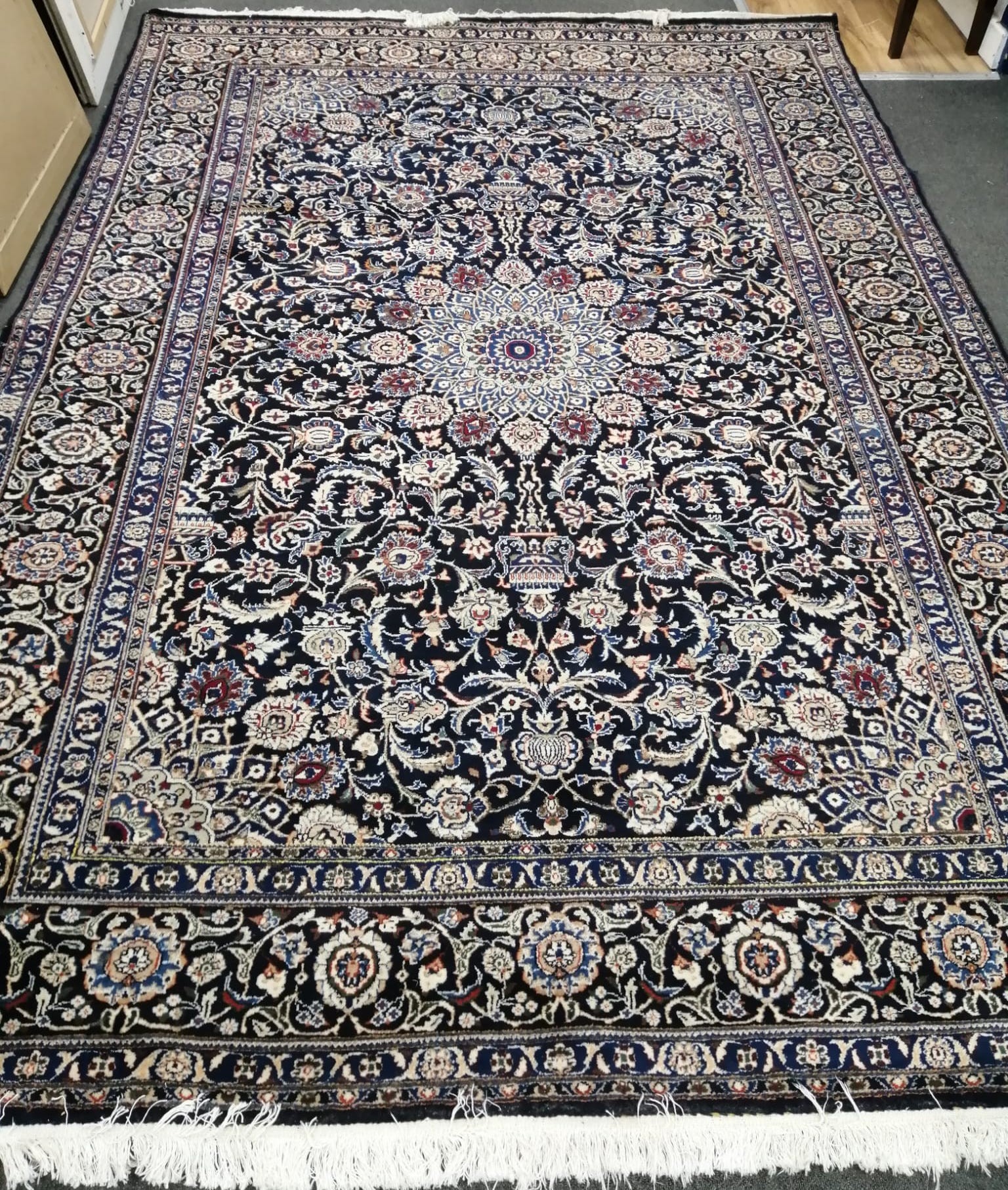 An Isfahan blue ground carpet, 296 x 201cm *Please note the sale commences at 9am.